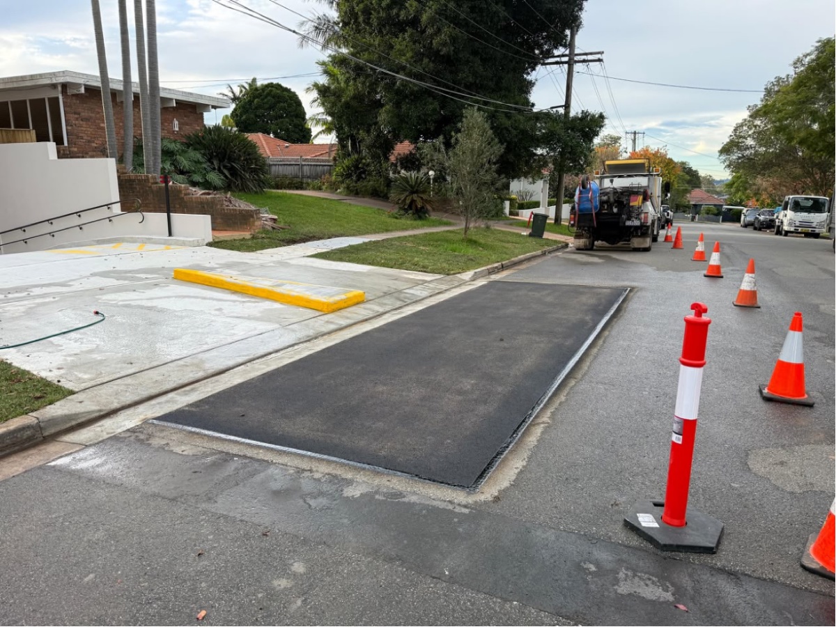 Finished asphalt road patch by Civil Brothers
