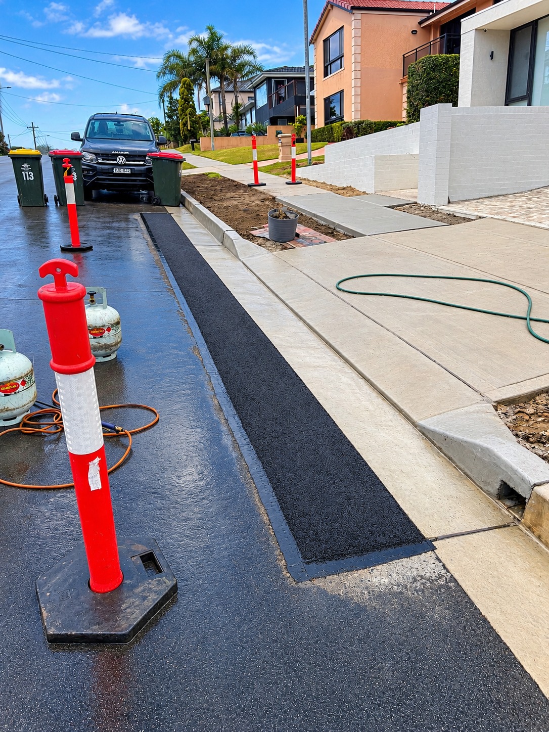 Crew repairing a road surface